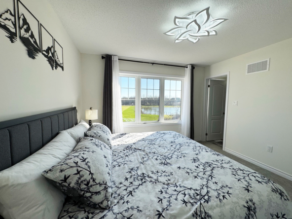 27 Sama Way Wasaga Beach - Primary Bedroom Overlooking Pond & Golf Course